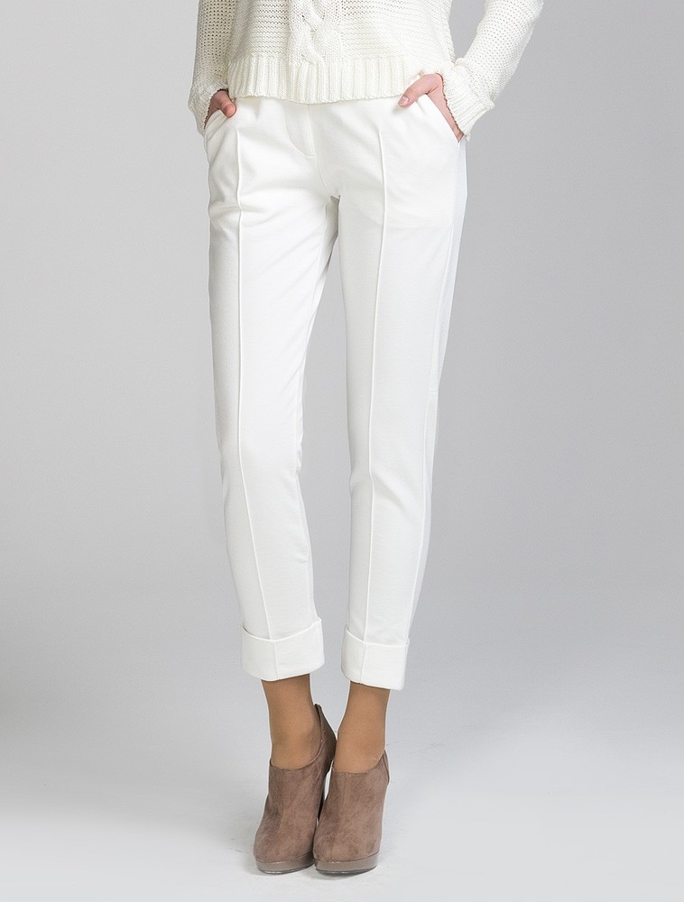 Модели белых брюк
